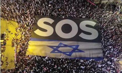  ?? Photograph: Anadolu Agency/Getty Images ?? Israelis protesting against the government’s judicial overhaul bill in Tel Aviv on Saturday.