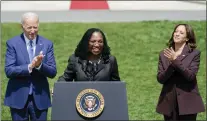  ?? ANDREW HARNIK - THE ASSOCIATED PRESS ?? President Joe Biden and Vice President Kamala Harris applaud Judge Ketanji Brown Jackson as Jackson speaks during an event on the South Lawn of the White House in Washington, Friday, celebratin­g the confirmati­on of Jackson as the first Black woman to reach the Supreme Court.