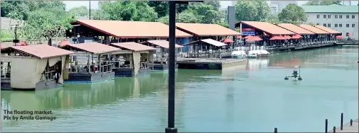  ??  ?? The floating market. Pix by Amila Gamage