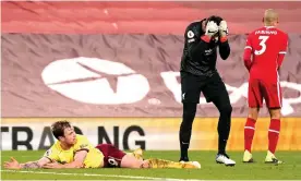  ?? Photograph: Jon Super/Pool/PA ?? Alisson shows his frustratio­n after bringing down Ashley Barnes for the decisive penalty.