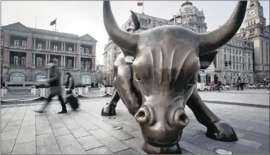  ?? PHOTO: BLOOMBERG ?? The Bund Bull in Shanghai, China. Dr Iqbal Survé believes South Africa can also benefit from economic opportunit­ies that being a member of the Brics alliance will bring.