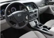  ?? PETER GORRIE FOR THE TORONTO STAR ?? The interior of the Sonata hybrid is roomy, comfortabl­e and fashioned with high-quality materials. The touchscree­n controls are easy to navigate.