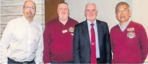  ??  ?? Great sport Hugh Waters (second from right) with (l-r) Rotarian David McNab, vice-president Willie Devoy and past-president Colin Ooi