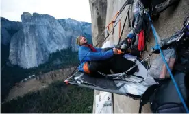  ?? Photograph: Alamy ?? Climbers camp overnight as they summit the Dawn Wall in Yosemite national park.