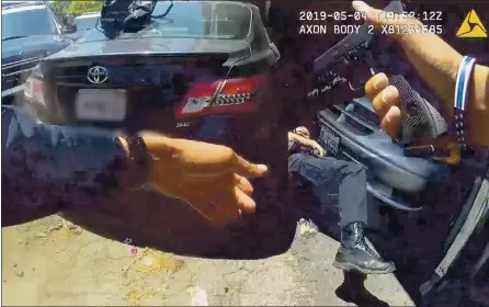  ?? SANTA CLARA COUNTY DISTRICT ATTORNEY’S OFFICE ?? The Santa Clara County District Attorney’s Office released body camera video Wednesday of the May 4, 2019, fatal police shooting of 24-year-old Stockton resident Efren Esquivel after he hit a police officer, seen on the ground, with his car.