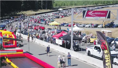  ??  ?? About 10,000 people packed Vancouver Island Motorsport Circuit last Sunday for the fifth annual Motor Gathering.