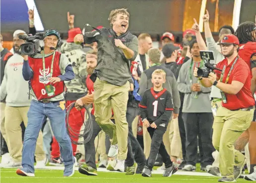  ?? KIRBY LEE/USA TODAY SPORTS ?? “Our kids don’t run from work,” Kirby Smart said after winning a second straight national title.