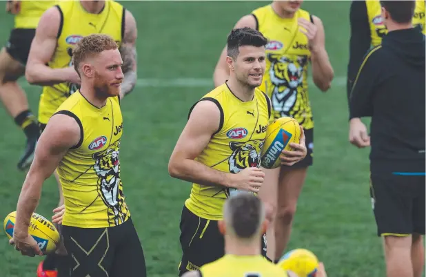 ?? Picture: AAP ?? HOPING FOR BEST: Trent Cotchin during a Richmond Tigers training session at Punt Rd Oval yesterday.