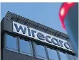  ?? FOTO: DPA ?? Der Wirecard-Schriftzug 2020 an der damaligen Firmenzent­rale.