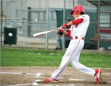  ?? RECORDER PHOTO BY CHIEKO HARA ?? Lindsay High School's Edgar Silva takes a swing Tuesday during the game against Woodlake High at Lindsay High School.