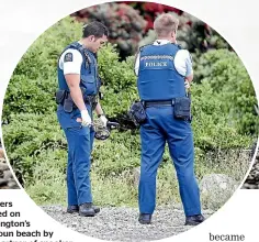  ?? MONIQUE FORD/STUFF ?? Flowers placed on Wellington’sSeatoun beach by the partner of snooker player Gary Hibbs, seen at left, while at right, police at the scene yesterday where they found a diving mask and a knife.