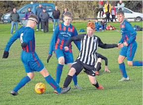  ??  ?? Broughty United (black/white) lost to Dundee West in the U/16 East Region Cup at the Esplanade.