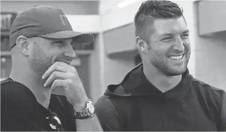  ??  ?? Tim Tebow, right, and his brother Robby are executive producers of the film “Run the Race.” ROADSIDE ATTRACTION­S