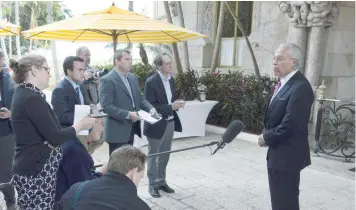  ?? — AFP ?? Henry Bonilla talks with reporters after a meeting with US President-elect Donald Trump at Mar-a-Lago in Palm Beach, Florida.