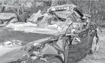  ?? NTSB via Florida Highway Patrol via Associated Press ?? This Tesla Model S collided with a truck last year, which killed the Tesla’s driver. The NHTSA said the truck “should have been visible to the Tesla driver for at least seven seconds prior to impact.”