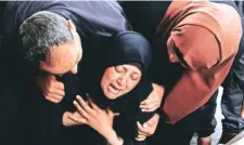  ?? Reuters ?? Gazans mourn relatives’ deaths in Rafah on Tuesday.