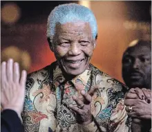  ?? PETER DEJONG AP FILE PHOTO ?? Mandela reacts after a meeting in 2007 at the Nelson Mandela Foundation building in Johannesbu­rg, South Africa.