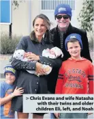  ??  ?? Chris Evans and wife Natasha with their twins and older children Eli, left, and Noah