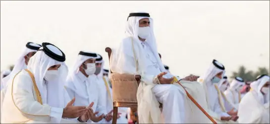  ??  ?? His Highness the Amir of State of Qatar Sheikh Tamim bin Hamad Al Thani and Father Amir performed Eid Al Fitr prayer along with citizens at the Al Wajba praying area on Thursday.
