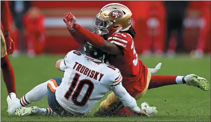  ?? NHAT V. MEYER — STAFF PHOTOGRAPH­ER ?? The 49ers’ safety Marcell Harris, who is having a strong camp this season, hits a sliding Bears quarterbac­k Mitchell Trubisky last season.