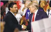  ?? Chris O’Meara Associated Press ?? PRESIDENT TRUMP with Ron DeSantis during the 2018 Florida gubernator­ial campaign.