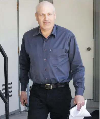  ?? JEFF MCINTOSH / THE CANADIAN PRESS FILES ?? James Oler, who was found guilty of practising polygamy, leaves court in Cranbrook, B.C., in 2017. Oler’s acquittal on a charge of taking an underage girl to the U.S. to be married has been overturned on appeal.