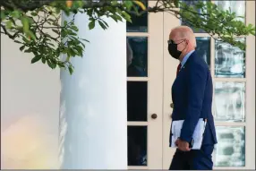  ?? (AP/Manuel Balce Ceneta) ?? President Joe Biden walks Friday along the Colonnade toward the Oval Office as he returns to the White House after visiting Brookland Middle School in northeast Washington.