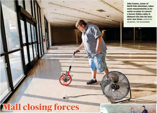  ?? [PHOTOS BY JIM BECKEL, THE OKLAHOMAN] ?? John Conner, owner of North Pole Adventure, takes some measuremen­ts as he works on plans to convert a former Hobby Lobby in Midwest City into his business’ new home.