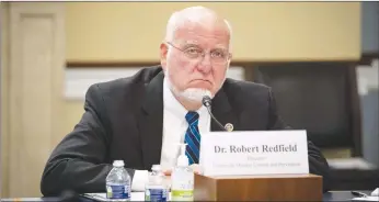  ?? Abaca Press/tns ?? Robert Redfield, director of the Centers for Disease Control and Prevention, listens during a House Appropriat­ions Subcommitt­ee hearing on June 4 on Capitol Hill in Washington, D.C.