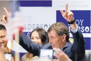  ?? JAY LAPRETE/ASSOCIATED PRESS ?? Troy Balderson, Republican candidate for Ohio’s 12th Congressio­nal District, greets supporters election night.