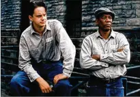  ?? COLUMBIA PICTURES ?? Tim Robbins (left) and Freeman star in the prison-break drama ‘The Shawshank Redemption.’