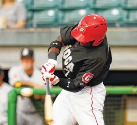  ?? STAFF PHOTO BY DOUG STRICKLAND ?? Chattanoog­a left fielder Taylor Trammell takes a swing against the Jackson Generals on Friday at AT&T Field.