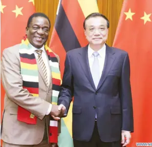  ?? - Picture by Xinhua ?? President Mnangagwa meets with Chinese Premier Li Keqiang at the Great Hall of the People in Beijing yesterday.