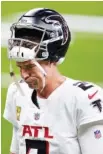  ?? AP PHOTO/BRETT DUKE ?? Atlanta Falcons quarterbac­k Matt Ryan walks off the field after last Sunday’s game at New Orleans. The Saints sacked him eight times as Atlanta lost.