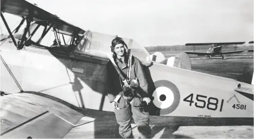  ?? COURTESY Andy CARSWELL / NARROW CONTENT ?? Andy Carswell had his life in front of him in 1941 while standing before a Fleet Finch trainer in Goderich, Ont. Andy is now 97 and lives in North Toronto with his wife, Dorothy, whom he met and married after the war.