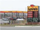  ?? ZHIHAN HUANG / MILWAUKEE JOURNAL SENTINEL ?? The unleaded gas price at Love’s Travel Stop in Elkhorn dropped to 99 cents per gallon on Thursday.