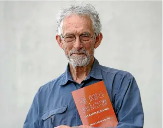  ?? MARTIN DE RUYTER/STUFF ?? Nelson author David Ka¯rena-Holmes with his new book Te Reo Maori: The Basics Explained.