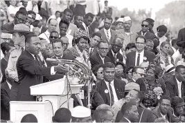  ?? ASSOCIATED PRESS ?? The Rev. Martin Luther King Jr., head of the Southern Christian Leadership Conference, speaks to thousands during his “I Have a Dream” speech in front of the Lincoln Memorial for the March on Washington for Jobs and Freedom in Washington, D.C., on Aug. 28, 1963.