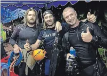  ?? FACEBOOK, HANDOUT PHOTO THE CANADIAN PRESS ?? Erik Brown, left, poses with fellow divers Mikko Paasi, centre, and Claus Rasmussen. The photo was posted to Facebook with the caption,”9 days. 7 missions and 63 hours inside Tham Laung Cave. Success.”