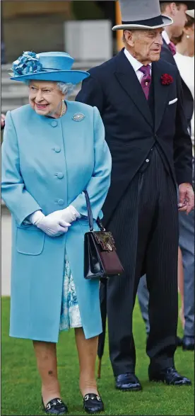  ??  ?? Duty: With the Queen at a Buckingham Palace garden party last week