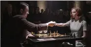  ?? NETFLIX ?? Russian chess player Vasily Borgov (Marcin Dorosinski) shakes the hand of American player Beth Harmon (Anya Taylor-Joy) in a scene from Netflix’s “The Queen’s Gambit.”