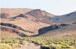  ?? JASON BEAN/THE RENO GAZETTE-JOURNAL ?? Montana Mountains loom over Thacker Pass in Nevada. Tribal lawyers have asked a judge to reconsider and block digging at a proposed mine.