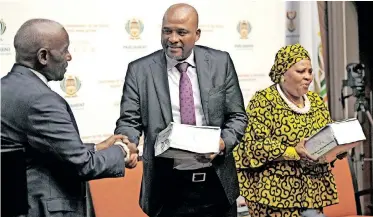  ?? (ANA) | ARMAND HOUGH African News Agency ?? HANDING over of Phala Phala report to Speaker Nosiviwe Mapisa-Nqakula at Parliament yesterday.