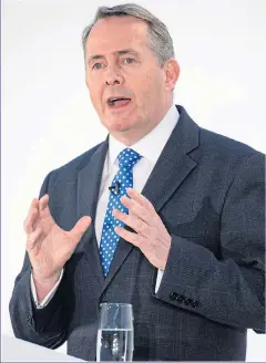  ??  ?? DEALS: The Internatio­nal Trade Secretary Dr Liam Fox