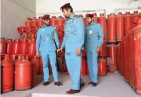  ?? Supplied photo ?? A team of civil defence officials carries out an inspection at a workers’ accommodat­ion in Ajman. —