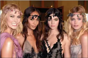  ??  ?? Stars: Schiaparel­li, left. Right, Karlie Kloss, Joan Smalls, Kendall Jenner, Doutzen Kroes at Versace. Inset, Rosie Huntington-Whiteley