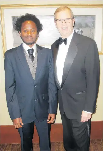  ?? PHOTOS: BILL BROOKS ?? Pictured with UNICEF Canada president and CEO David Morley at the 25th anniversar­y celebratio­n of the UNICEF Water for Life Gala held Oct. 14 at the Hyatt Regency is keynote speaker Ishmael Beah, a former child soldier from Sierra Leone who is now a...