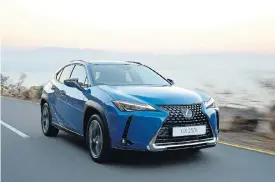  ??  ?? The new Lexus UX is one of the most eyecatchin­g vehicles in the crossover segment. Left: Squint your eyes a bit and the Toyota CH-R appears somewhere inside that bold design.