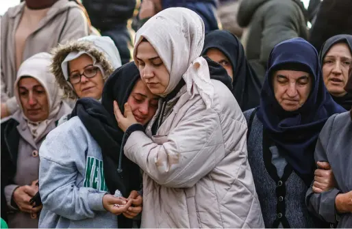  ?? ?? People attend the funeral of Mukaddes Elif Topkara and Adem Topkara, two of the six victims of Sunday’s blast that took place on Istiklal Avenue, in Istanbul, Turkey, on Monday. — reuters