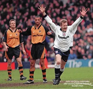  ?? ?? John Mcginlay celebrates after scoring against Wolves at Burden Park